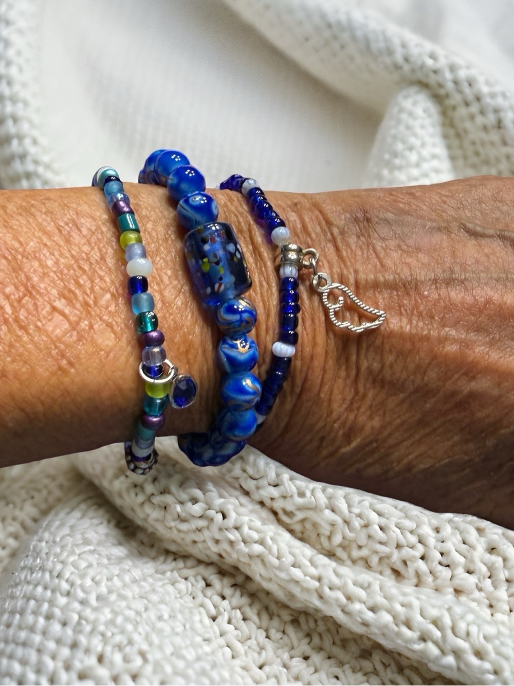 Hand Crafted Blue Glass Bead Trio Bracelet Set with Silver Wing Charm